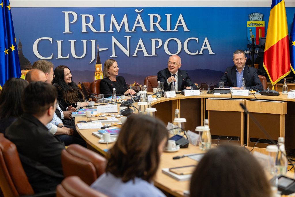 Emil Boc a intampinat partenerii europeni la Primarie Clujul va experimenta unitati de productie pentru cereale si detergenti direct in cartiere ca intr un laborator